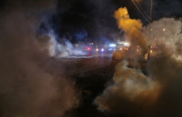 Police tear gas protesters again